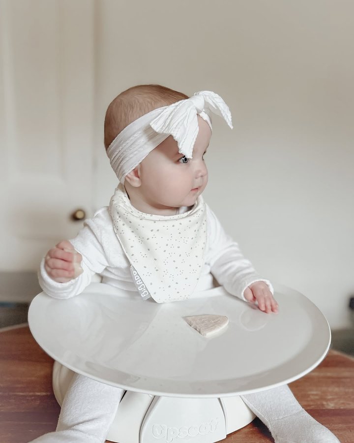 Instagram post by @thelittlemary.rose.and.everly for Upseat. Caption reads: [...] AD | A baby seat like no other, the....