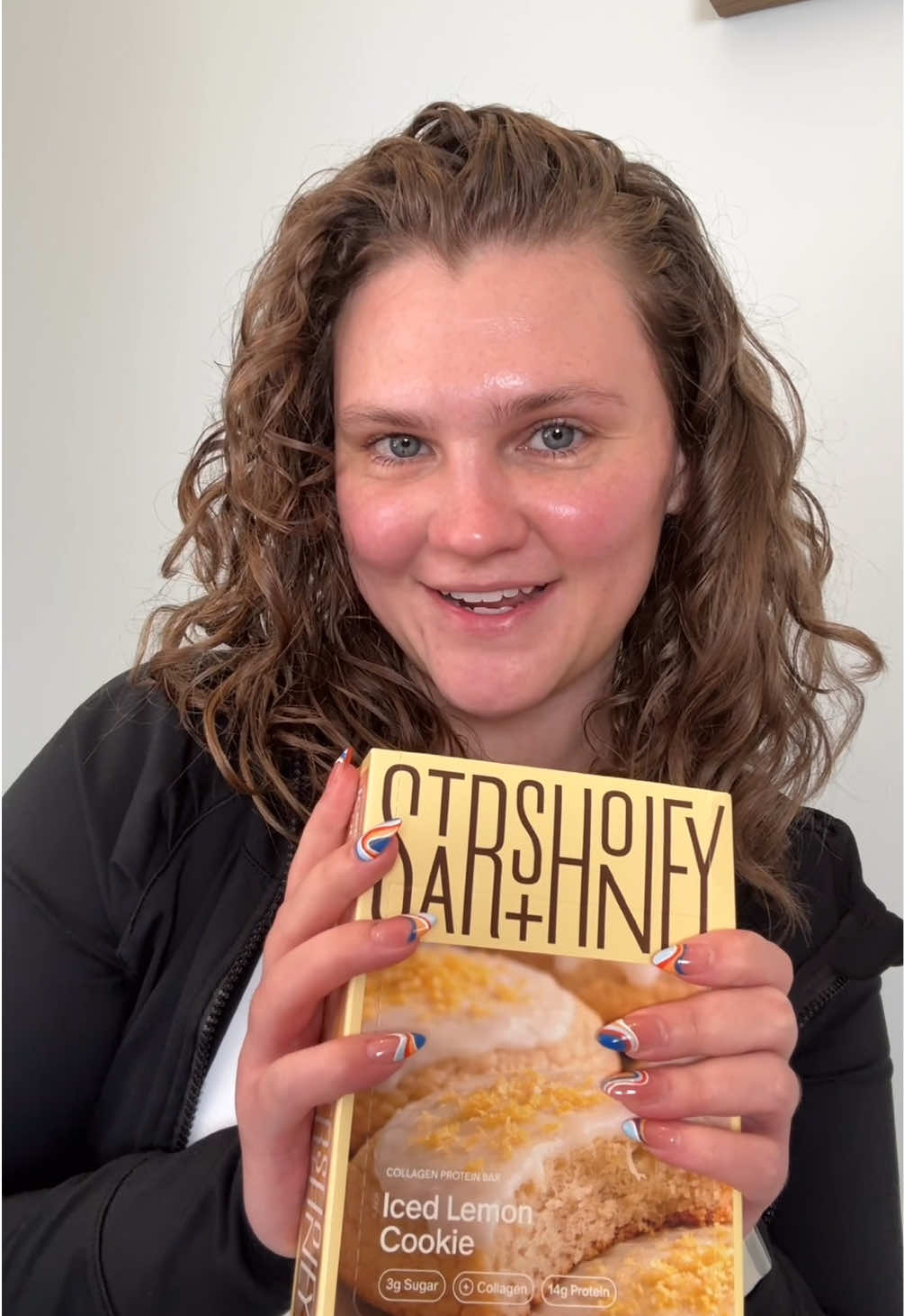 TikTok post by @christypcarson for Stars + Honey. Caption reads: Unbox my iced lemon cookie flavor protein bars....