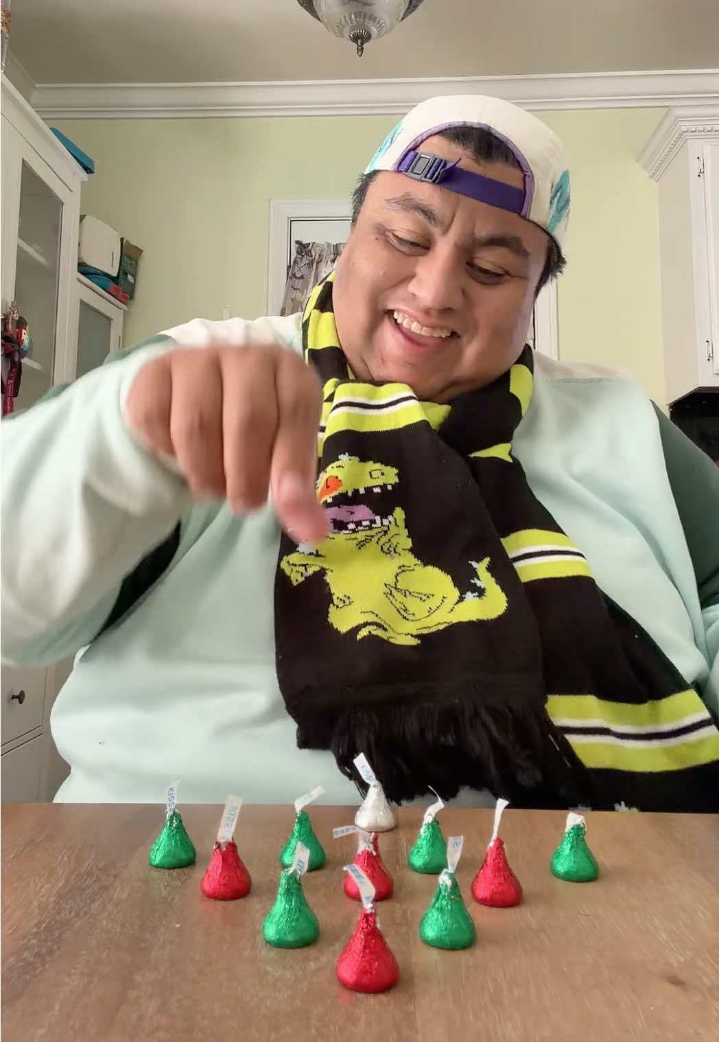 TikTok post by @thenostalgiclatino for Hersheyland. Caption reads: My favorite commercial #nostalgia #hersheyskisses....