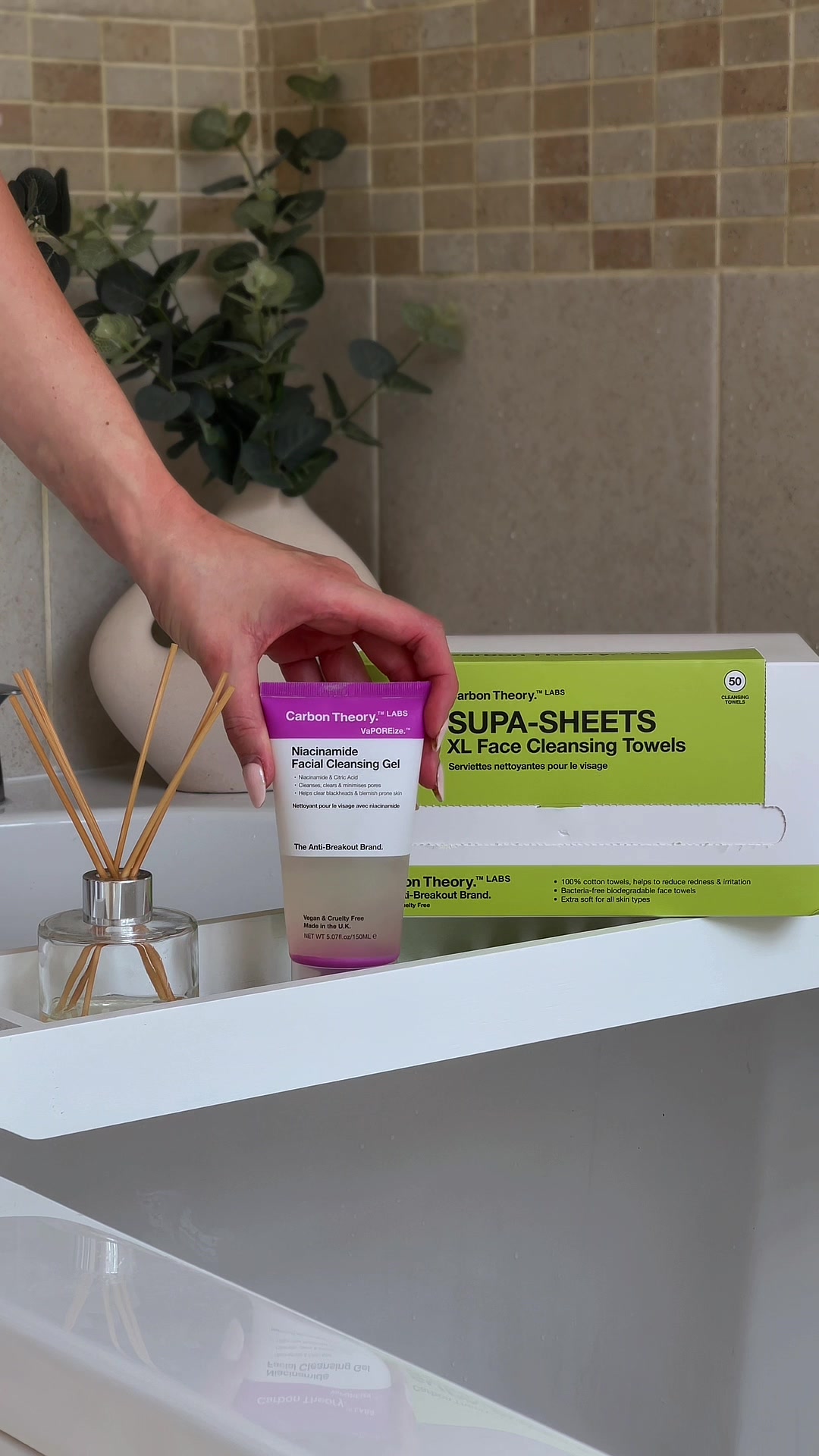 TikTok post by @theugcgirlie for Carbon Theory. Caption reads: [...] 🧖‍♀️✨ Obsessed with how gentle the @Carbon....