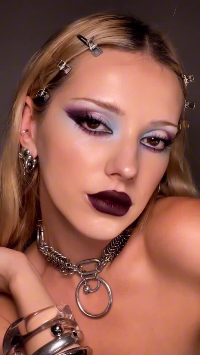 Instagram post by @daniellemarcan for NABLA Cosmetics. Caption reads: love a deep berry and misty blue combination ⋅˚₊‧....