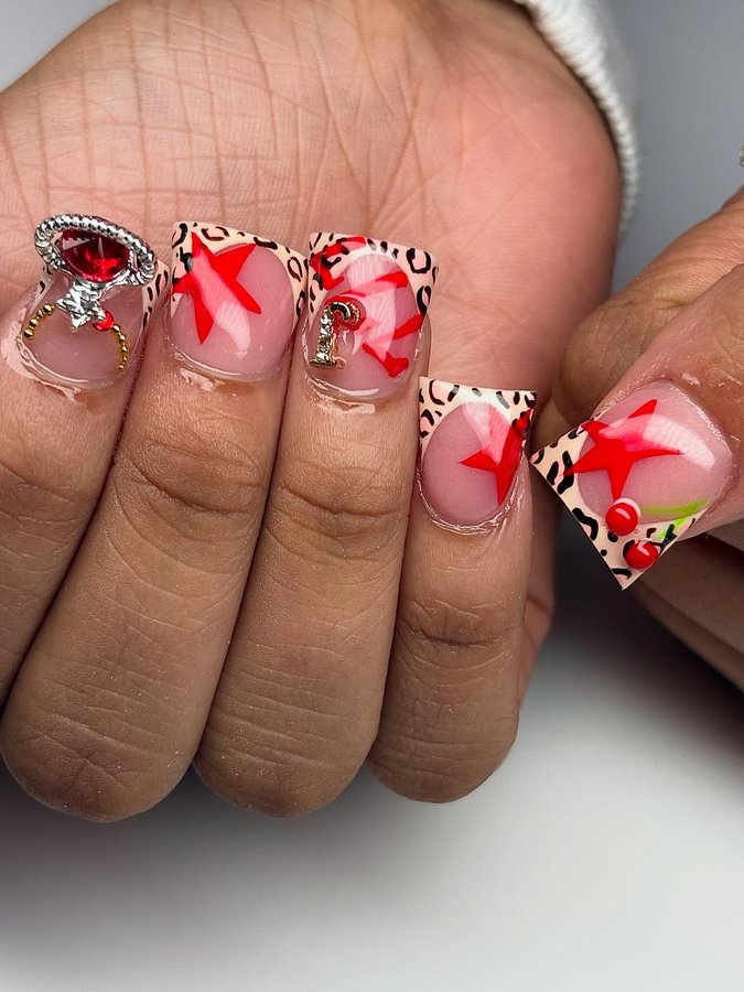 Instagram post by @nailedbydache for VBeautyPure. Caption reads: [...] #cheetahprintnails #ducknailinspo....