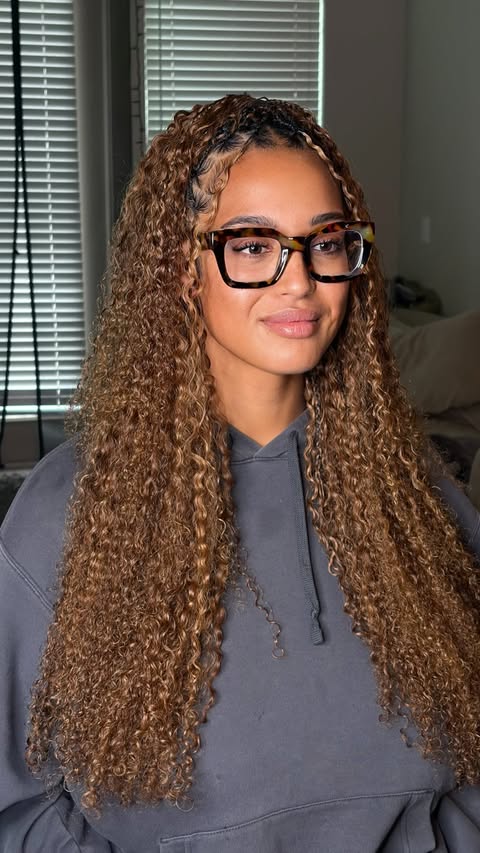 Instagram post by @qvrhair_official for QVR Hair. Caption reads: [...] gorgeous Burmese Curly crochet using QVR....