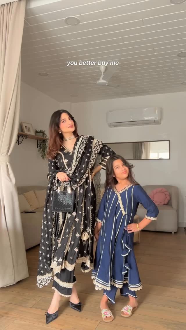 Instagram post by @farheennaqi for Hopscotch. Caption reads: Matching festive fits but who wore it better?....