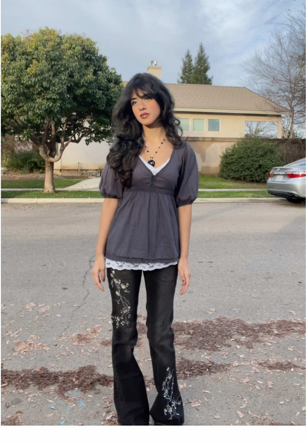 TikTok post by @luvcrumbs for Emmiol. Caption reads: hihi @EMMIOL Denim #emmiol #ootd #foryou....