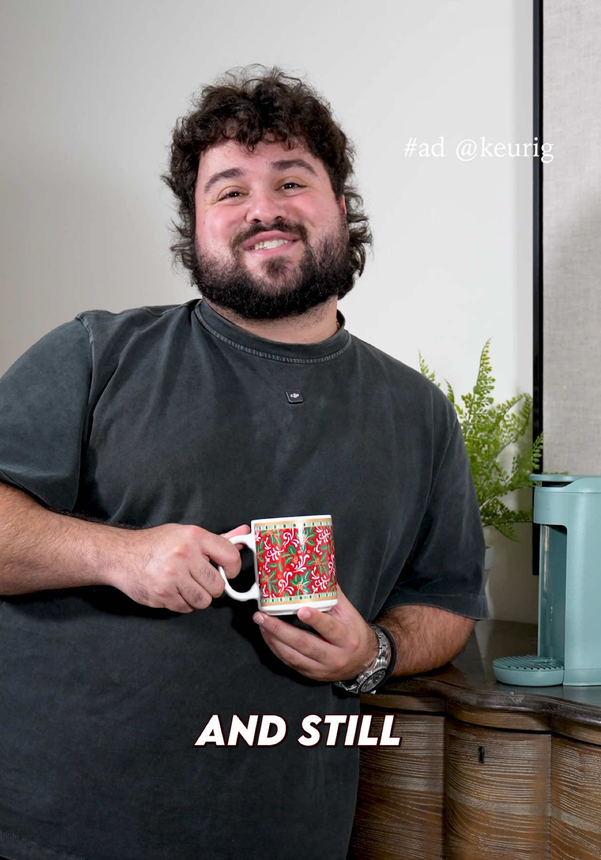 TikTok post by @eliemagic for Keurig. Caption reads: #ad Travel is chaos… but my @Keurig K-Mini Mate....