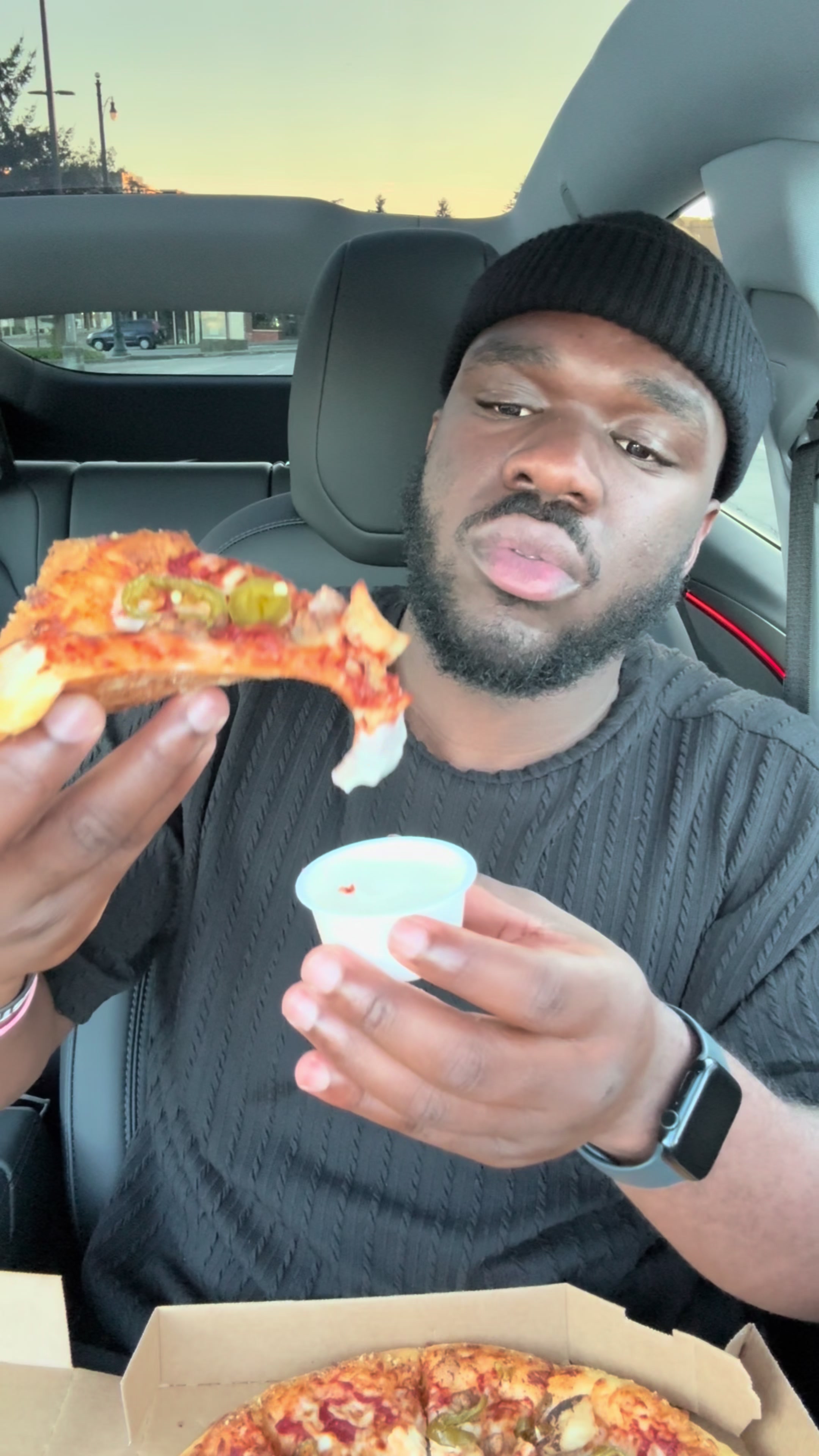 TikTok post by @akhsulie for Domino's. Caption reads: #ad Ordering the entire @Domino’s menu is valid....