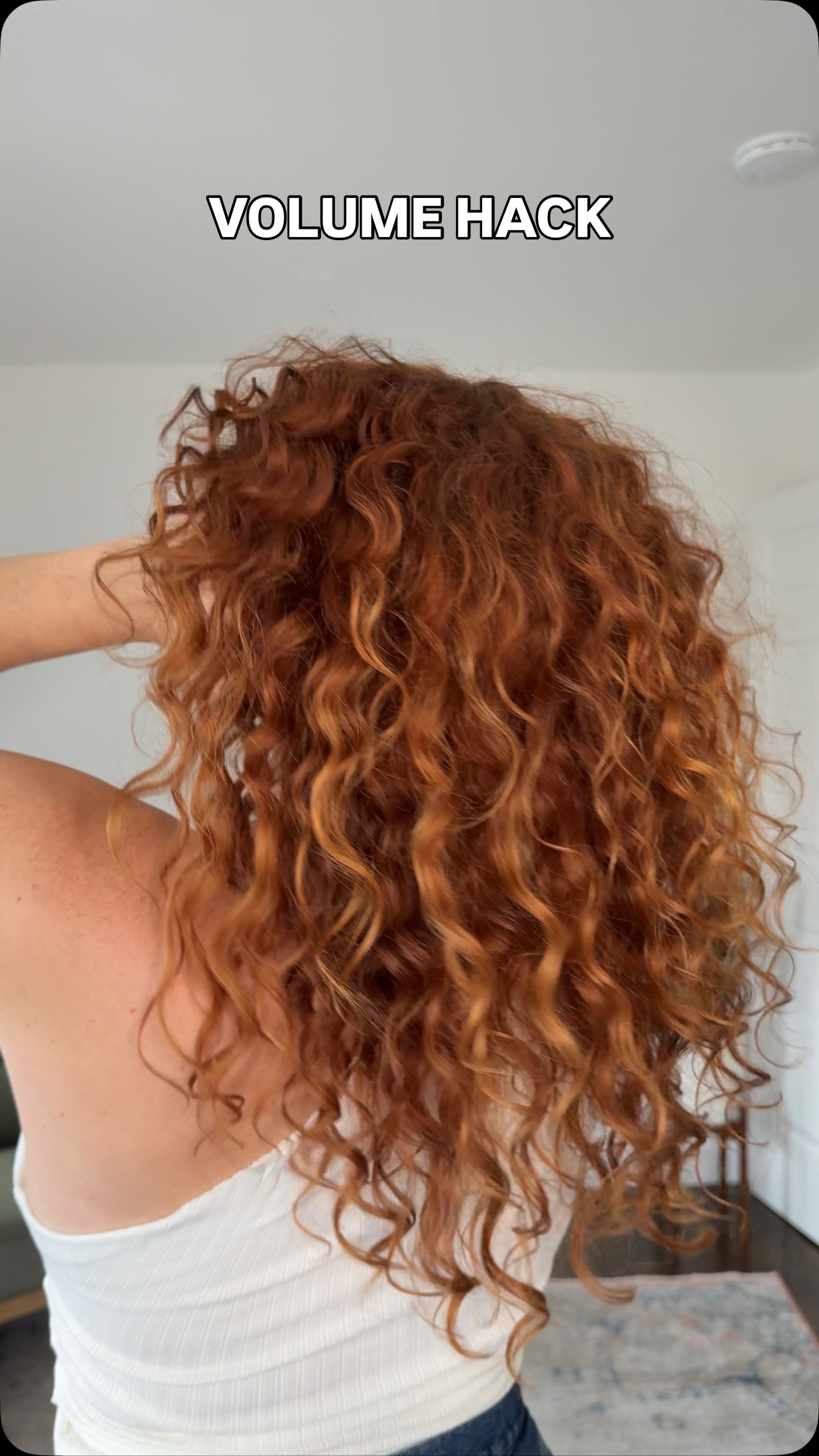 Instagram post by @brittminetti for Moroccanoil. Caption reads: ultimate volume hack for ‘90s curls✨....