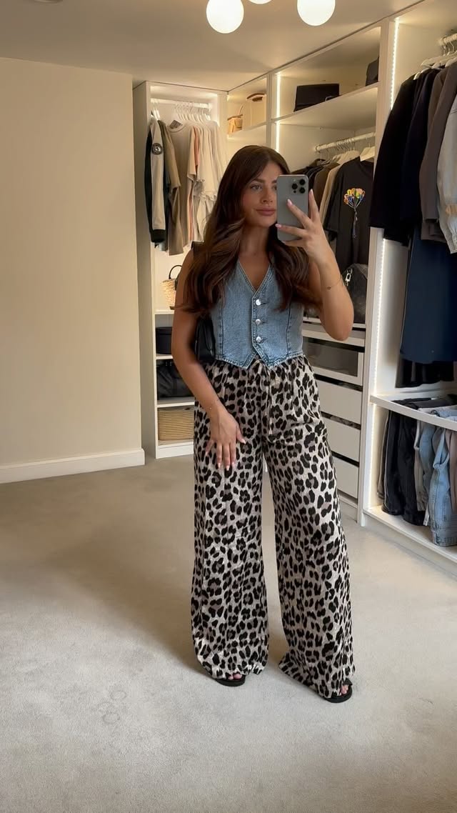 Instagram post by @wornbymandy for Rebellious Fashion. Caption reads: [...] leopard print trousers 3 ways 🤎....