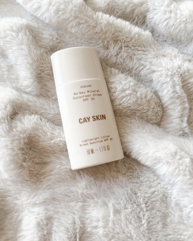 Instagram post by @ashlieewing_ for Cay Skin. Caption reads: My new must have is @cayskin their spf lotion is....