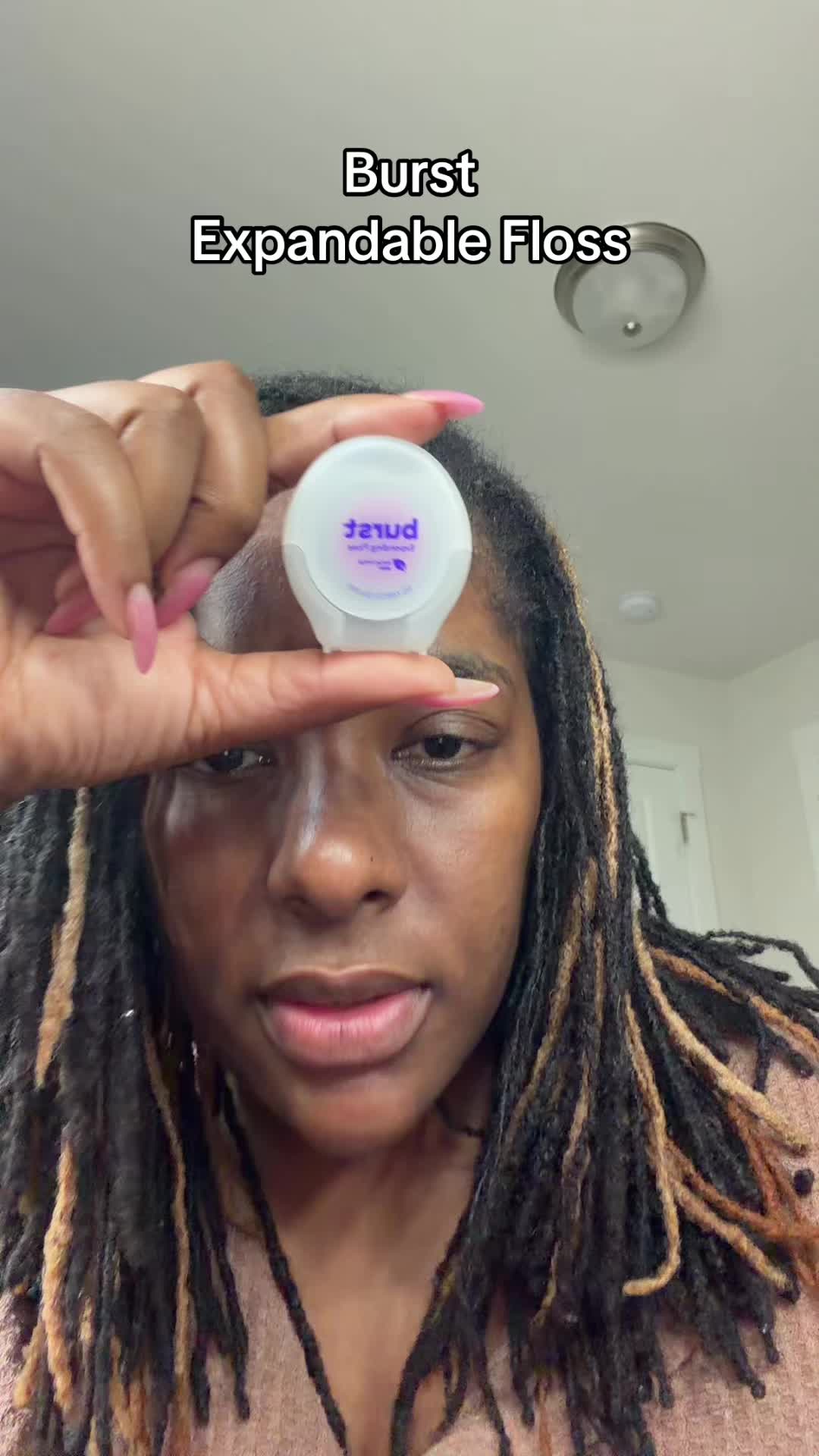 TikTok post by @injessicascorner for Burst Oral Care. Caption reads: [...] at home! #floss #flossing @BURST Oral Care.