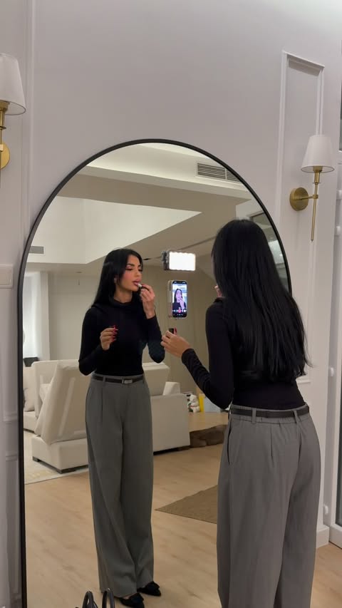 Instagram post by @hala.owais for talabat. Caption reads: [...] vlogs 🖤 spend an evening with me....