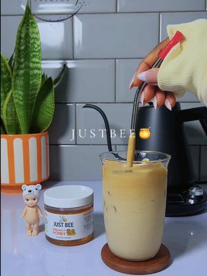TikTok post by @curatedxyvette for Just Bee Honey. Caption reads: [...] an immunity booster Honey🍯 #honey....