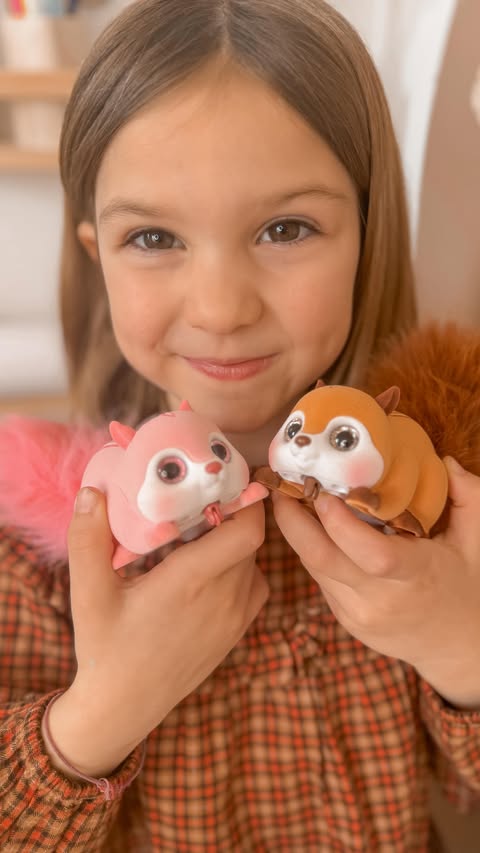 Instagram post by @rosie_nicholls for ZURU Toys. Caption reads: meet candyfloss & toffee 🩷🤎 the cutest names....