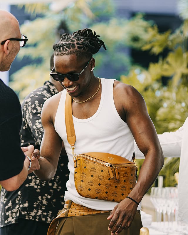 Instagram post by @koolkidnelly for Hennessy. Caption reads: ad | @hennessy moments..