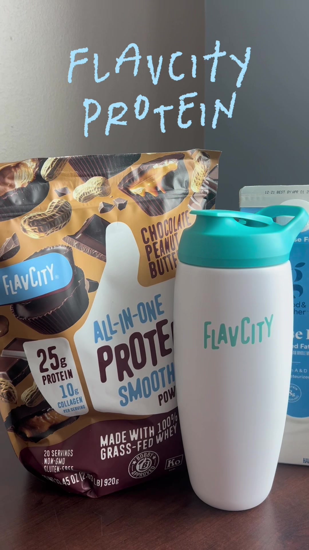 TikTok post by @graciebryann for ShopFlavCity. Caption reads: @ShopFlavCity YUMMY 🍫 🥜 #protein #bobbyapproved....
