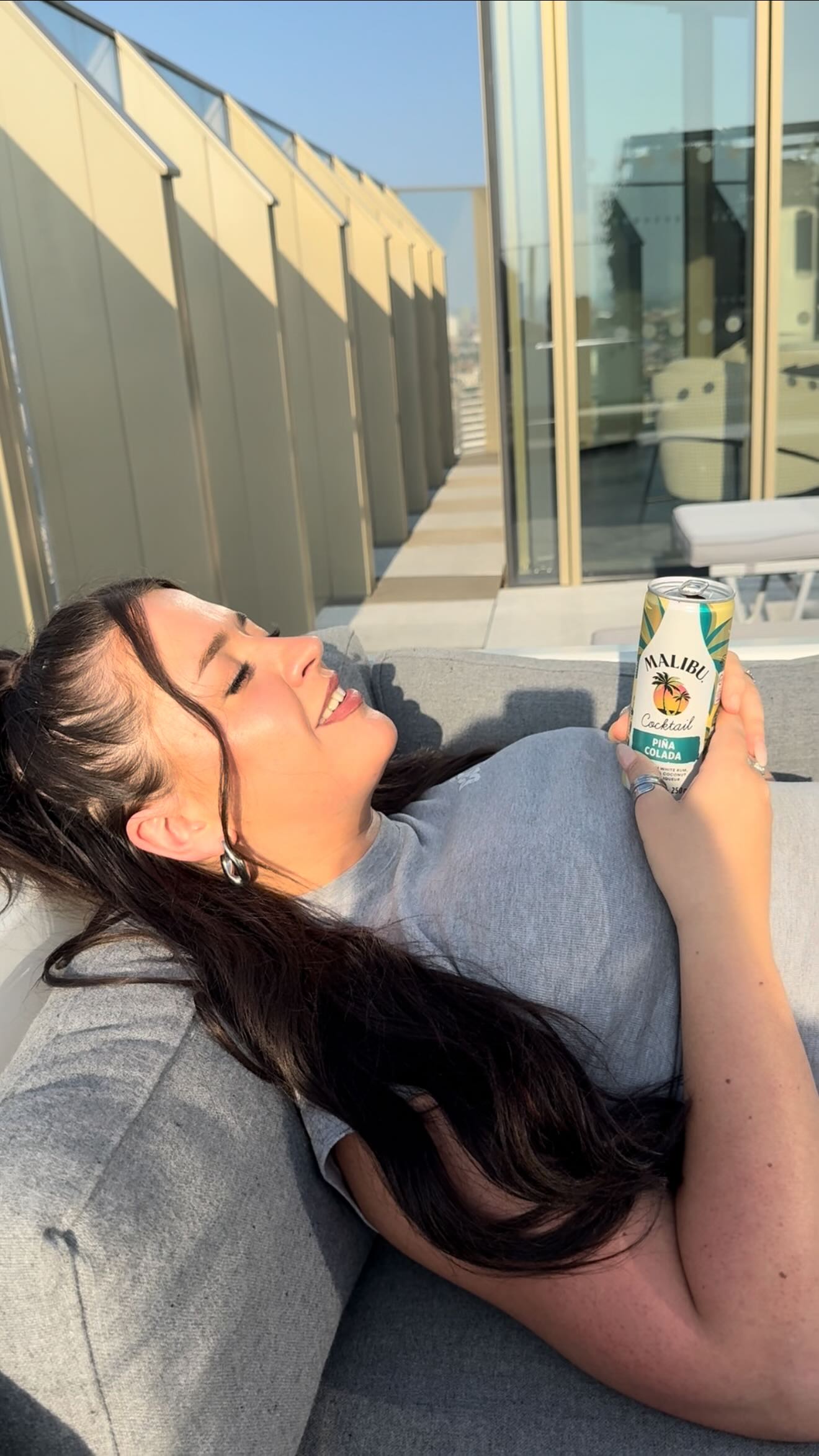 Instagram post by @bambinobecky for Malibu Drinks. Caption reads: the ladies are set for this week’s heatwave 🔥😜....