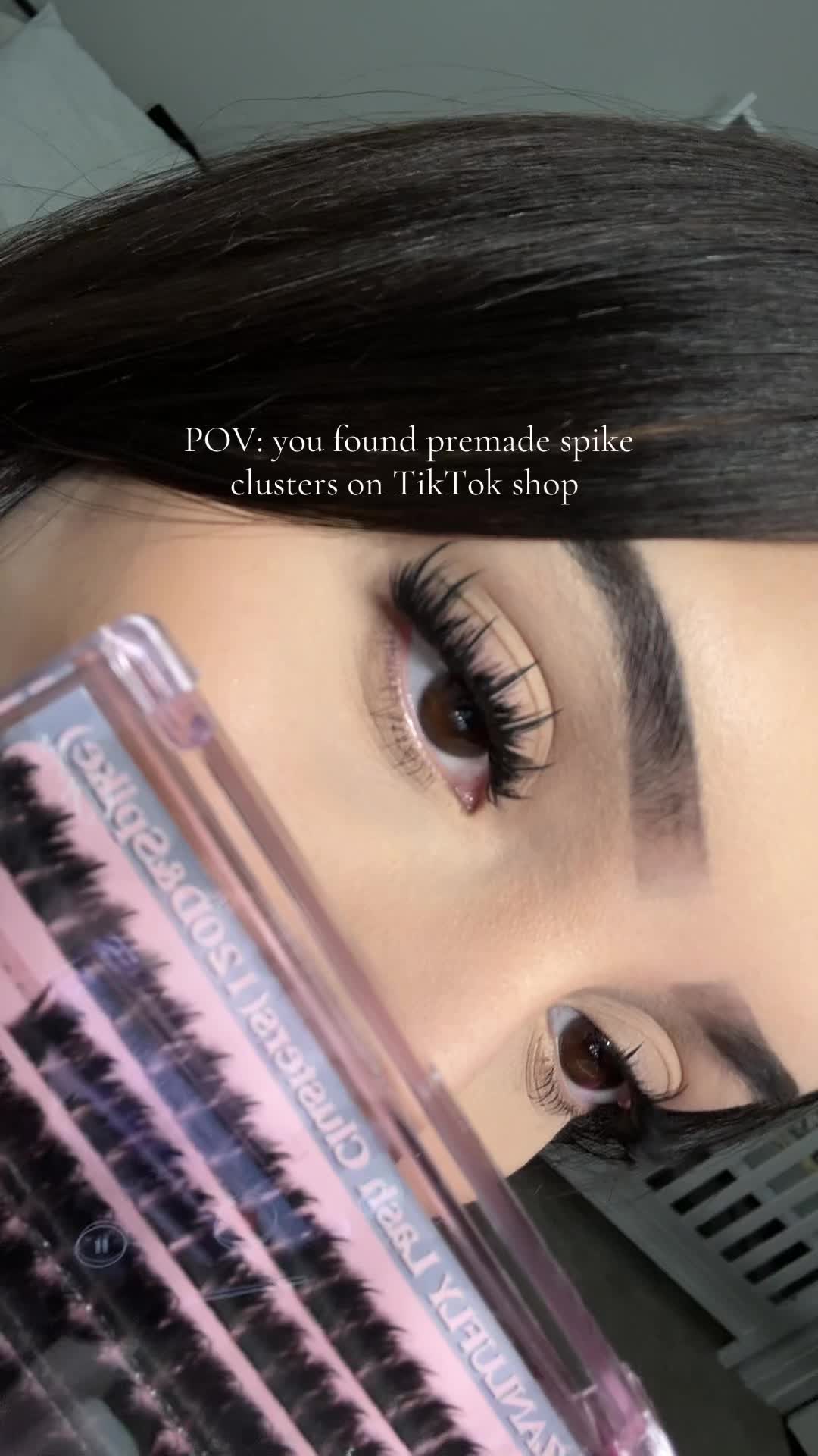 TikTok post by @_constancemarieee for Zanlufly Beauty. Caption reads: [...] #lashclusters #hudalashes @zanlufly Beauty.