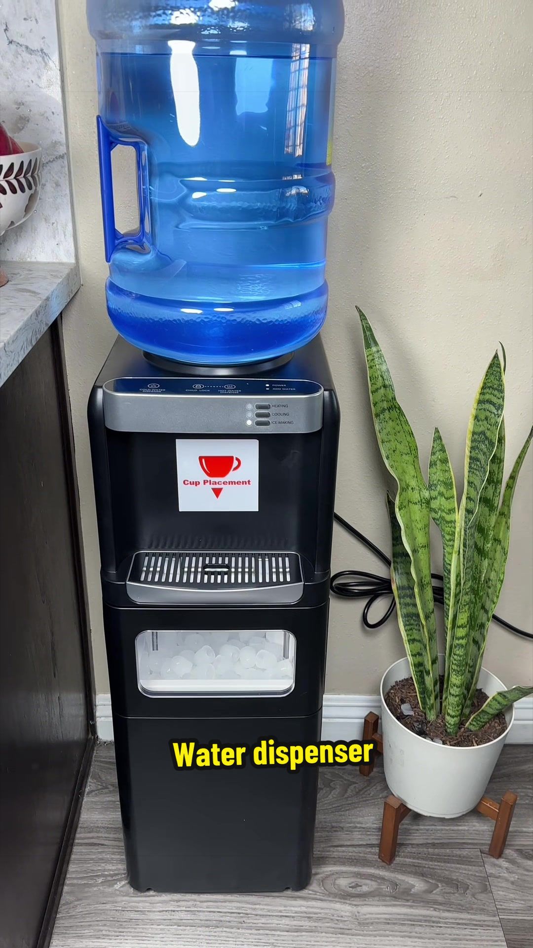 TikTok post by @cocinandoconcindy for Cowsar Appliance. Caption reads: [...] #hotandcoldwaterdispenser @Cowsar Appliance.