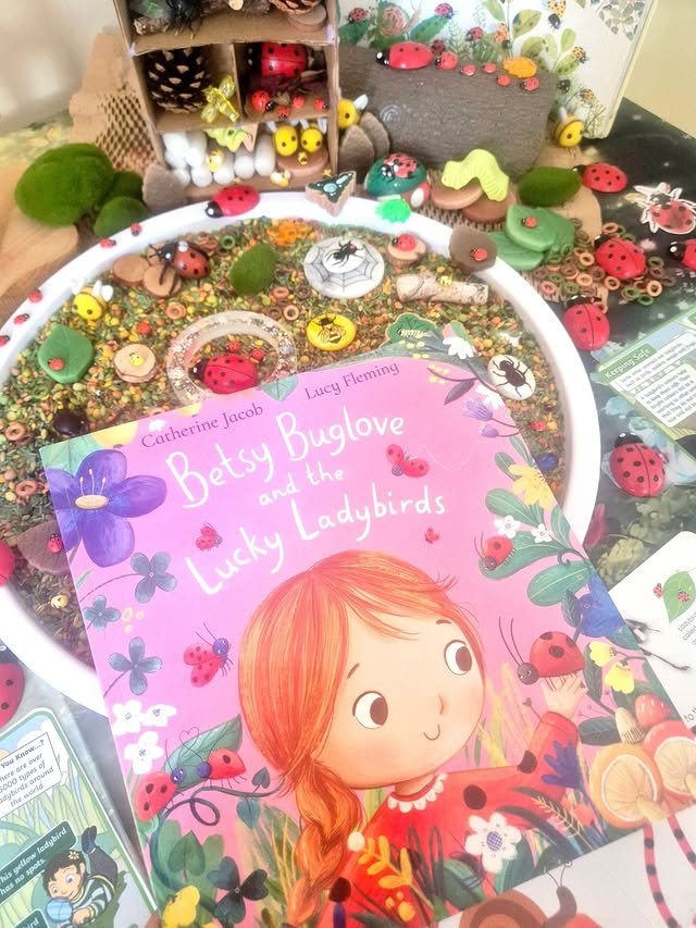 Instagram post by @catherinejacobwriter for Scholastic. Caption reads: Ad|Pr • 🐞 Betsy Buglove and the Lucky Ladybirds....