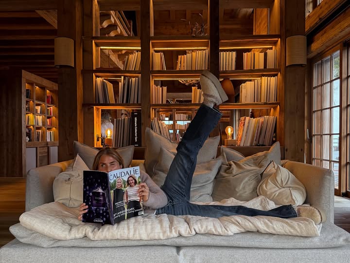 Instagram post by @oliviatps for Caudalie. Caption reads: ad | In my chalet girl era 🎀.