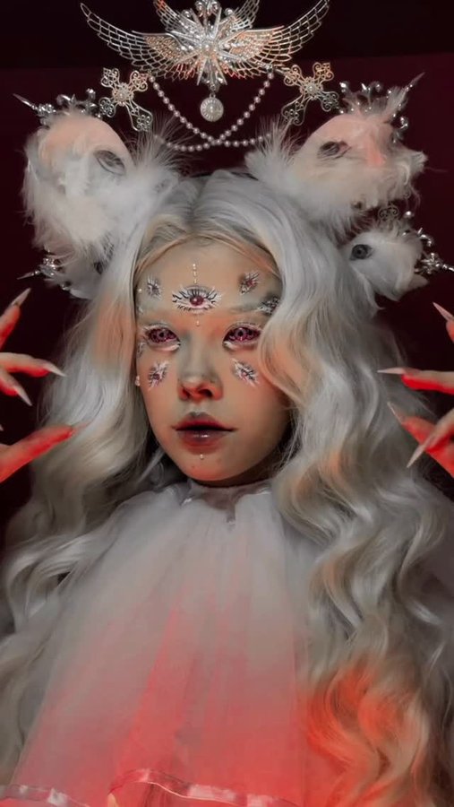 Instagram post by @xoanyvn for PinkyParadise. Caption reads: 👁️👁️👁️👁️👁️👁️ #angel #angelmakeup 
Contacts....