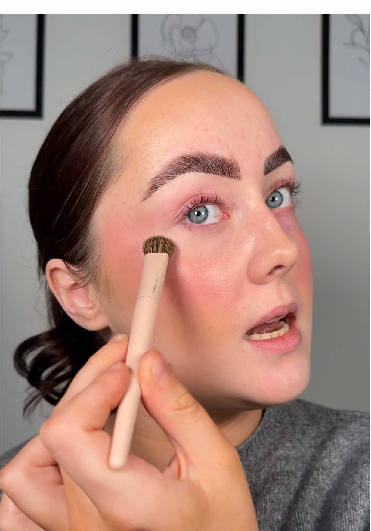 TikTok post by @errinfettermua for HNB Cosmetics. Caption reads: [...] Using the shade 0.5N @HNB Cosmetics....