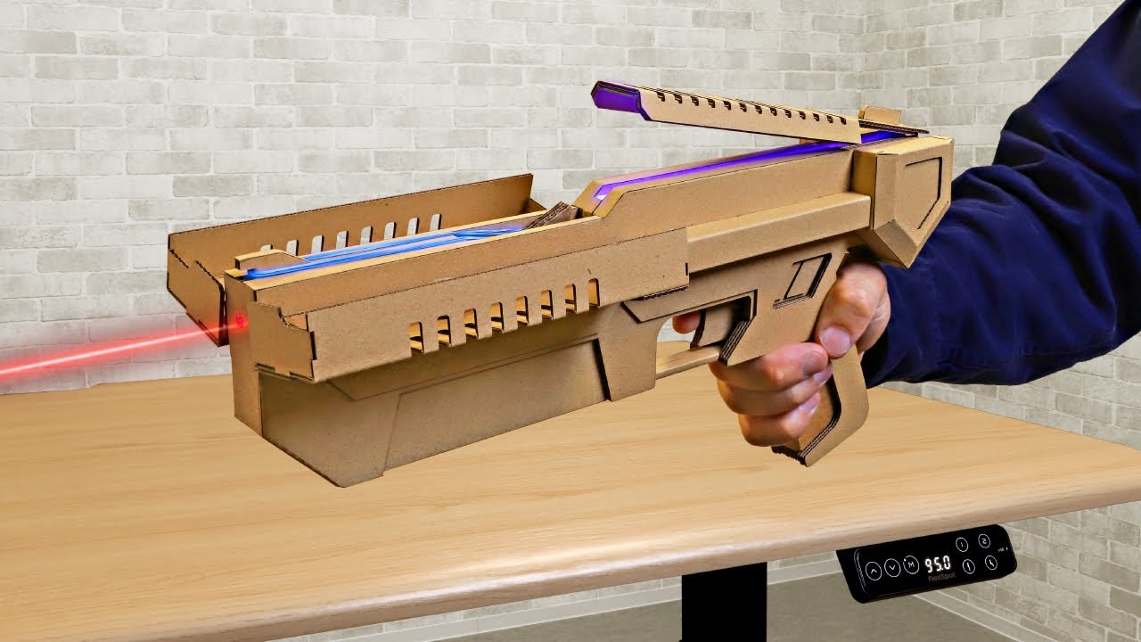 YouTube post by @dancreator for FlexiSpot.JP. Caption reads: 【FlexiSpot】Making Cool Rubber Band Rifle with....