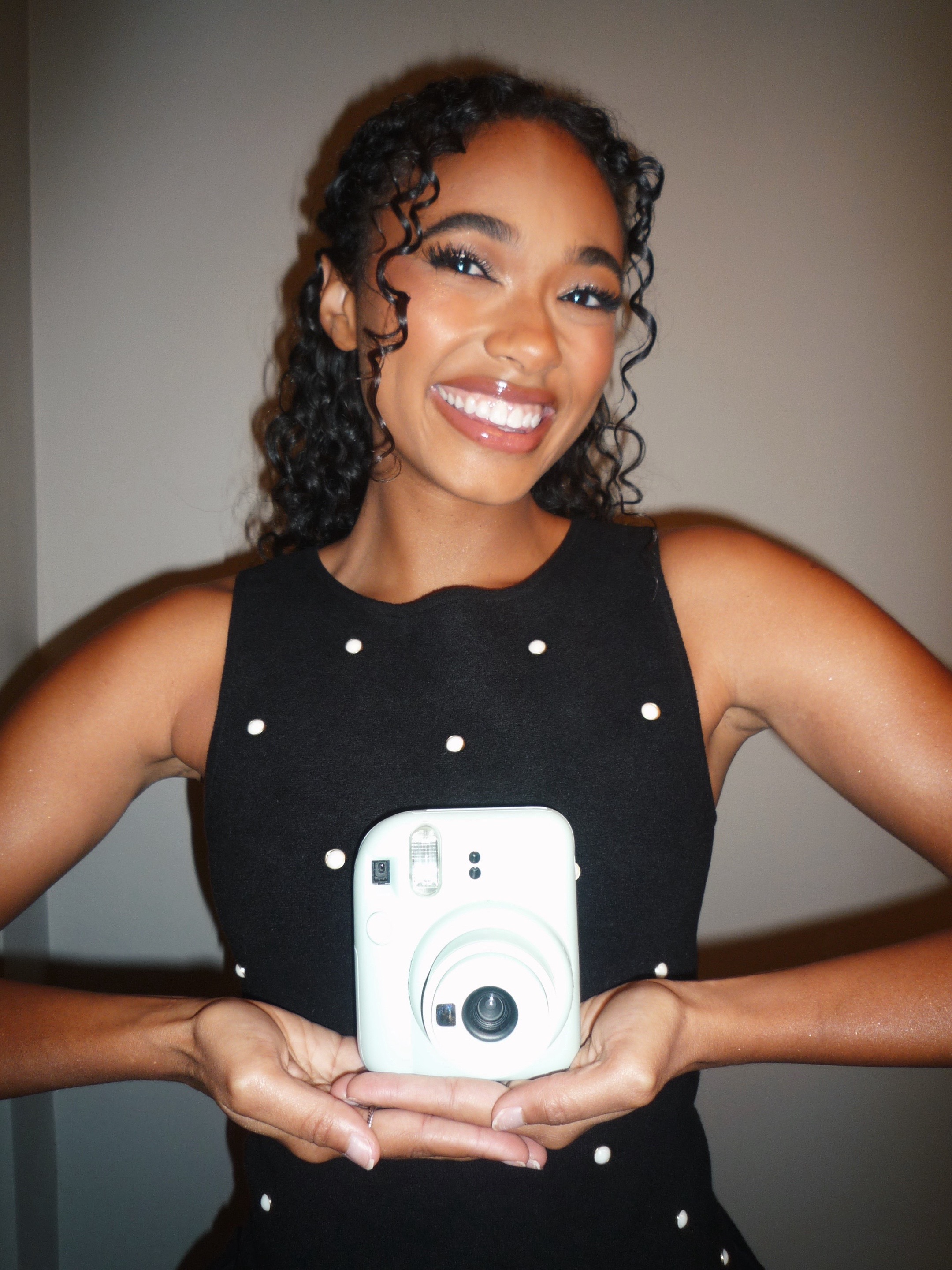 TikTok post by @chandlerlkinney for Instax. Caption reads: a December to remember @Instax ❄️  #instaxpartner....