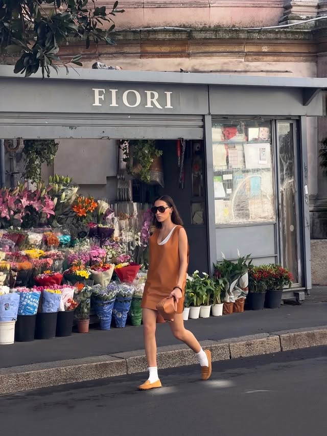 Instagram post by @ginevramavilla for Tod's. Caption reads: [...] and ended up somewhere else 📚🌷 // @tods....