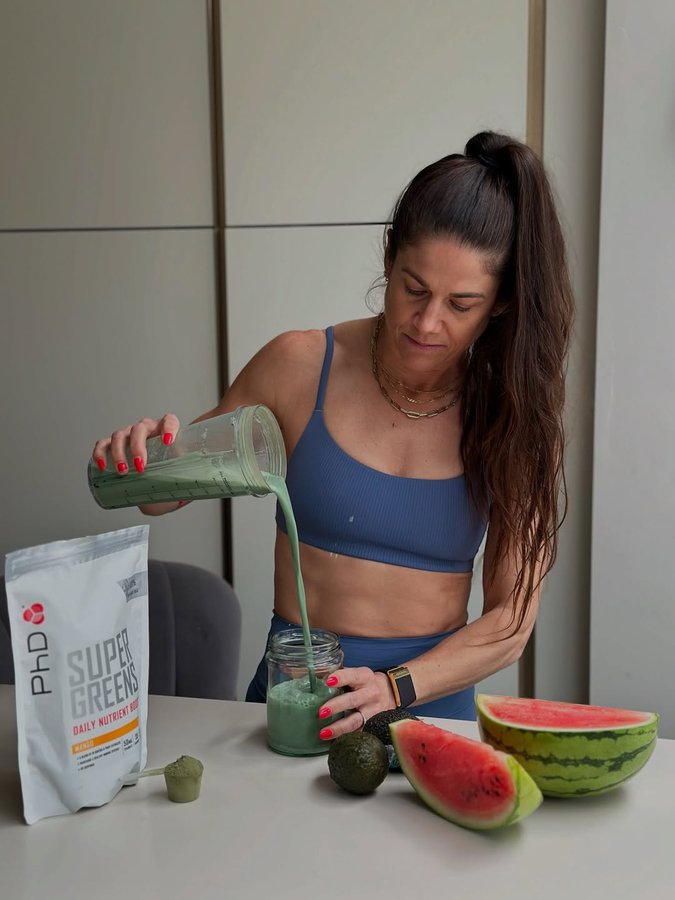 Instagram post by @skulptur.me for PhD Nutrition. Caption reads: [...] + soak up some Vitamin D • @phdnutrition....