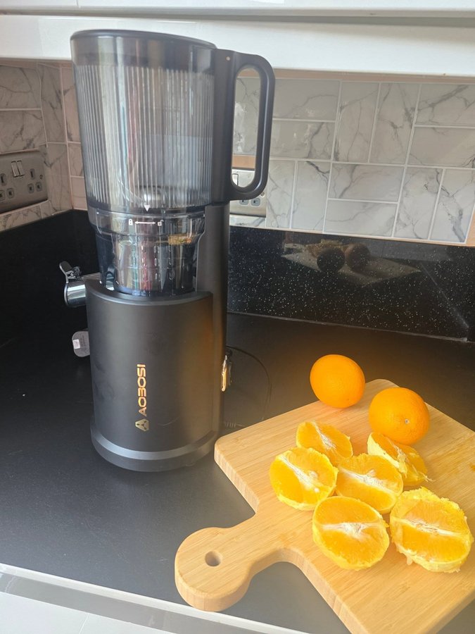 Instagram post by @mylifeas.kimwatt for Aobosi. Caption reads: Ad GIFTED 

 @aobosihome 

This juicer is perfect....