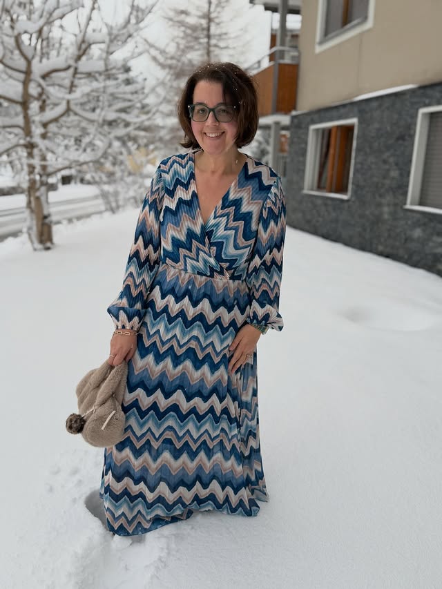 Instagram post by @whoisthatlondonmum for Blue Vanilla. Caption reads: [...] however, is my stunning dress by....