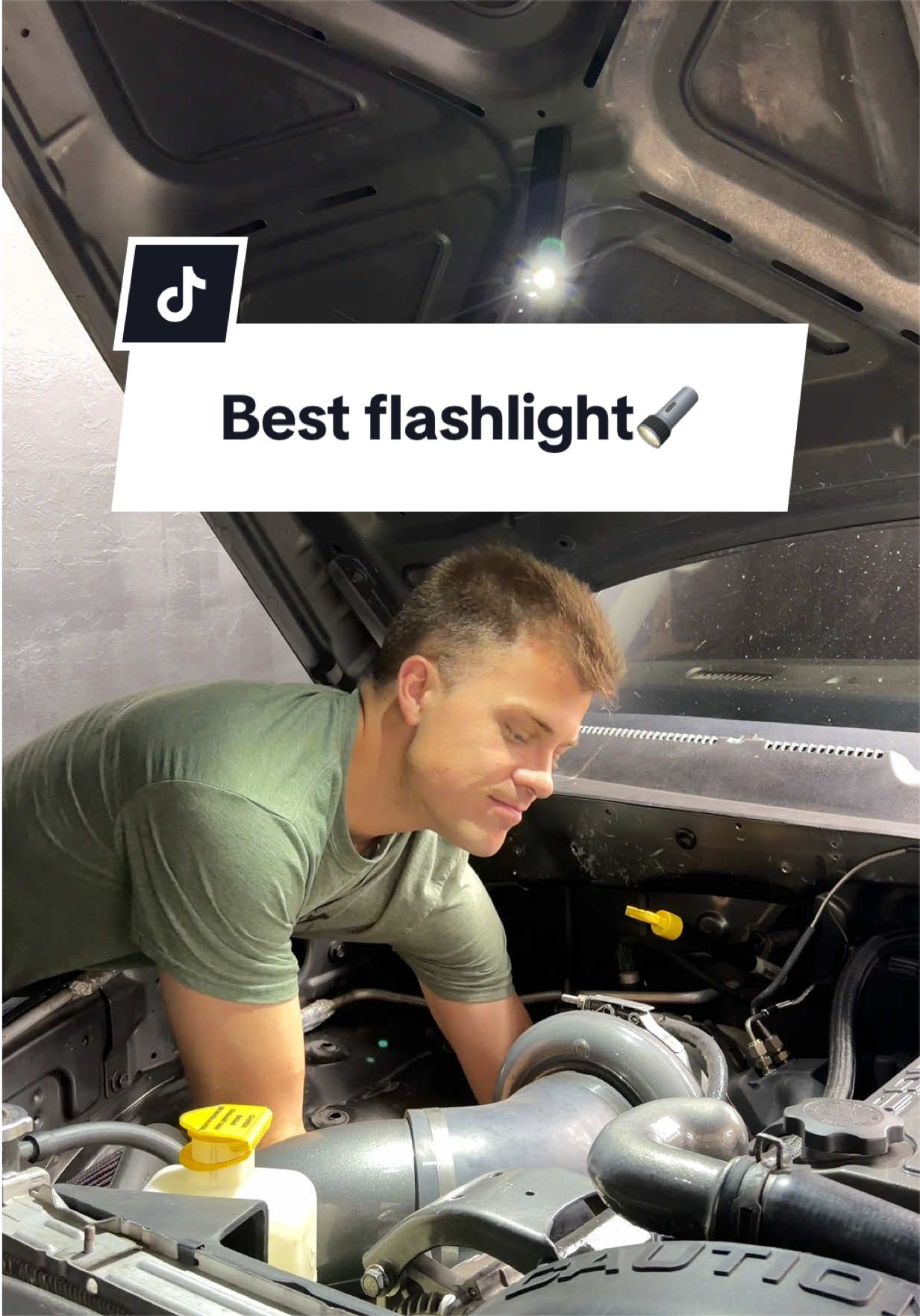 TikTok post by @vossgarage for Olight. Caption reads: Thanks to @OLIGHT for making the best EDC....