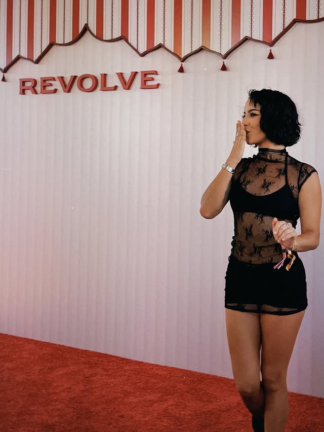 Instagram post by @isabelamerced for REVOLVE. Caption reads: boots! That’s my monkey, Boots 🐒 @revolve....