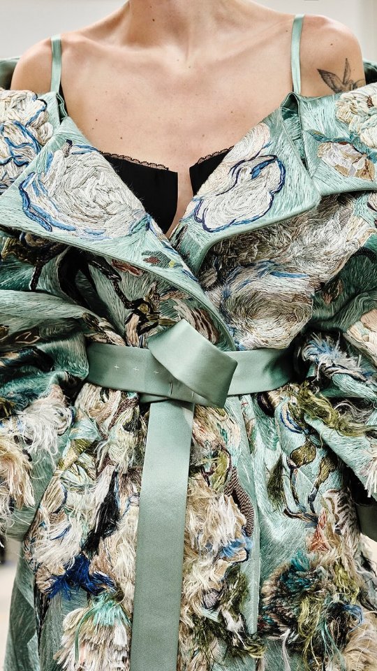 Instagram post by @couturenotebook for GIVENCHY. Caption reads: This @givenchy coat in mint duchesse satin with....