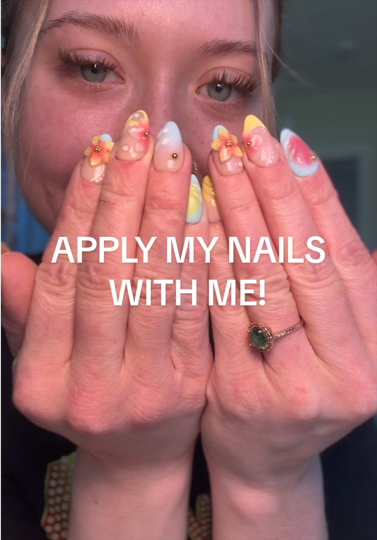 TikTok post by @abbydlane for Ersa Nails. Caption reads: These are SOOOO CUTEEEE!🌊🌅🌸🌞 @Ersa Nails my go....