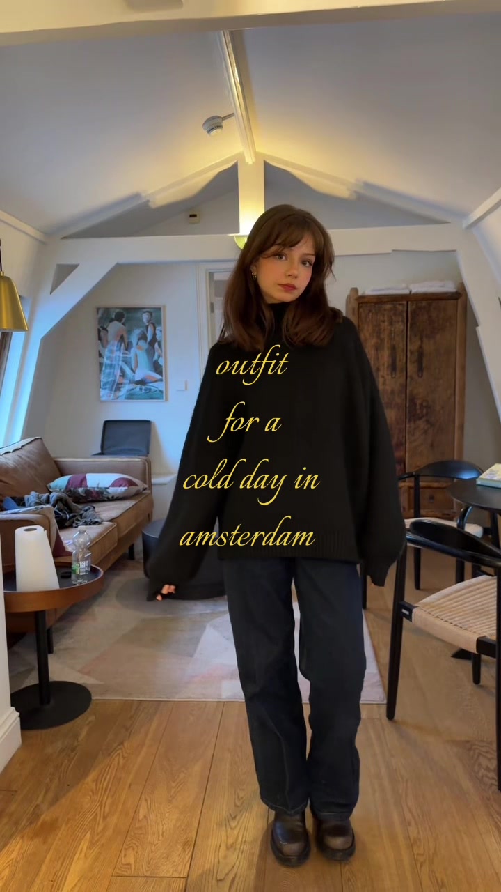 TikTok post by @lilith.marie.xx for Motel Rocks. Caption reads: cozy sweater for a cozy snowy walk in Amsterdam✨....