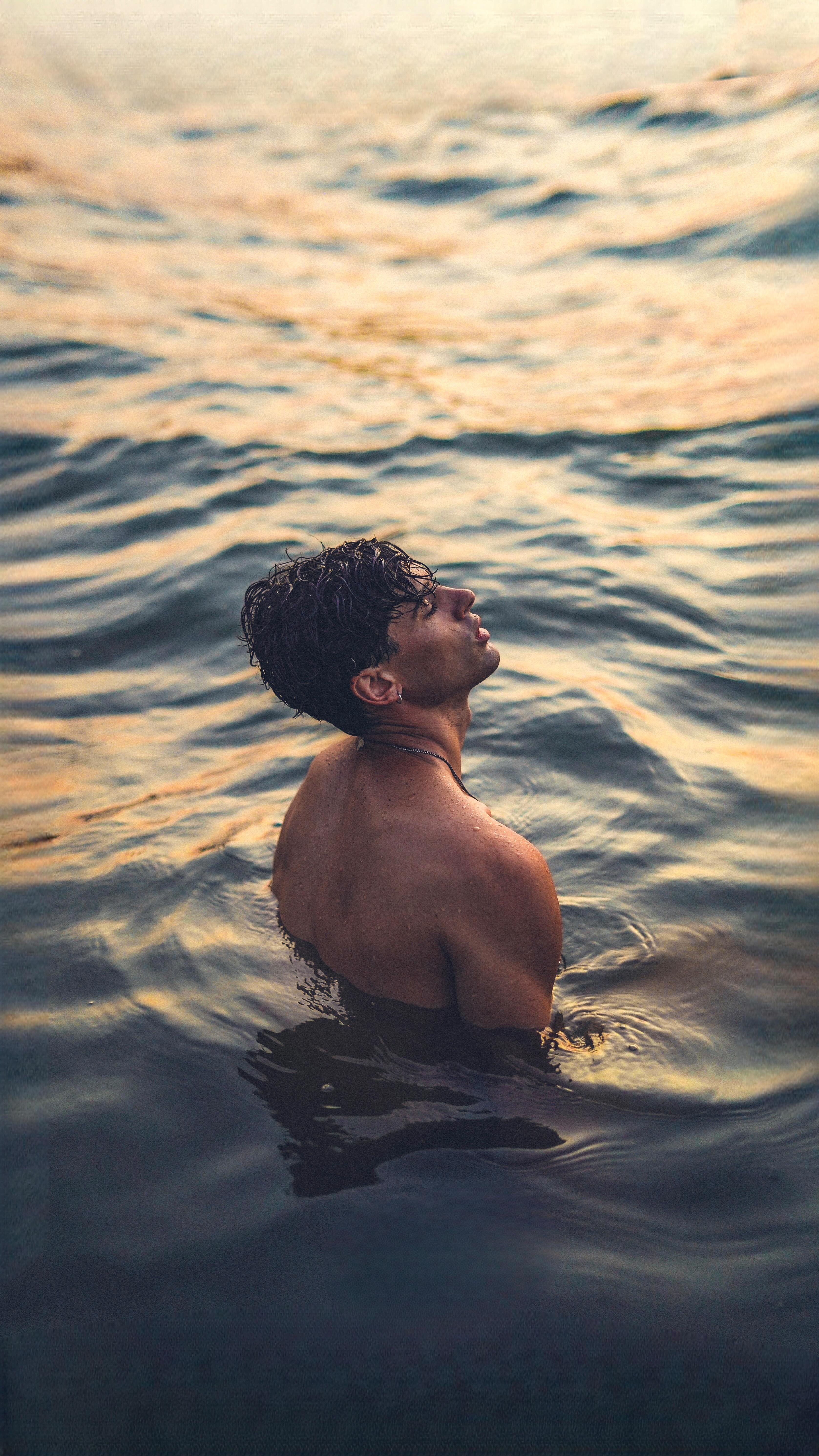 Instagram post by @danielillescas for Issey Miyake Parfums. Caption reads: [...] Celebrate #WorldOceansDay with....