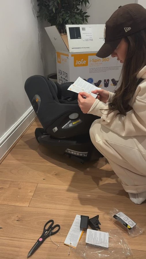 Instagram post by @annarosecunningham for Joie Baby Gear. Caption reads: Unboxing and Fitting Novas new car seat, it’s so....