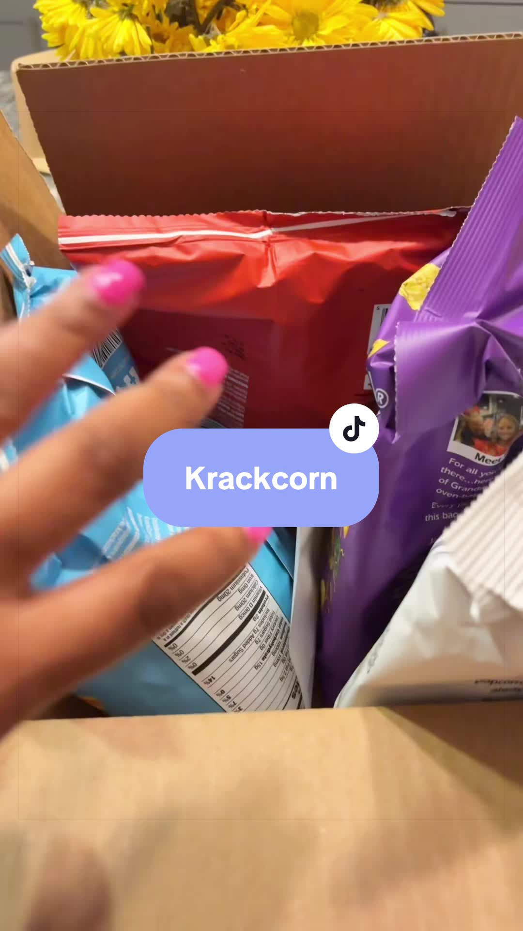 TikTok post by @shopaholicsahm for KrackCorn Popcorn. Caption reads: [...] popcorn just isn’t hitting. This krackcorn....