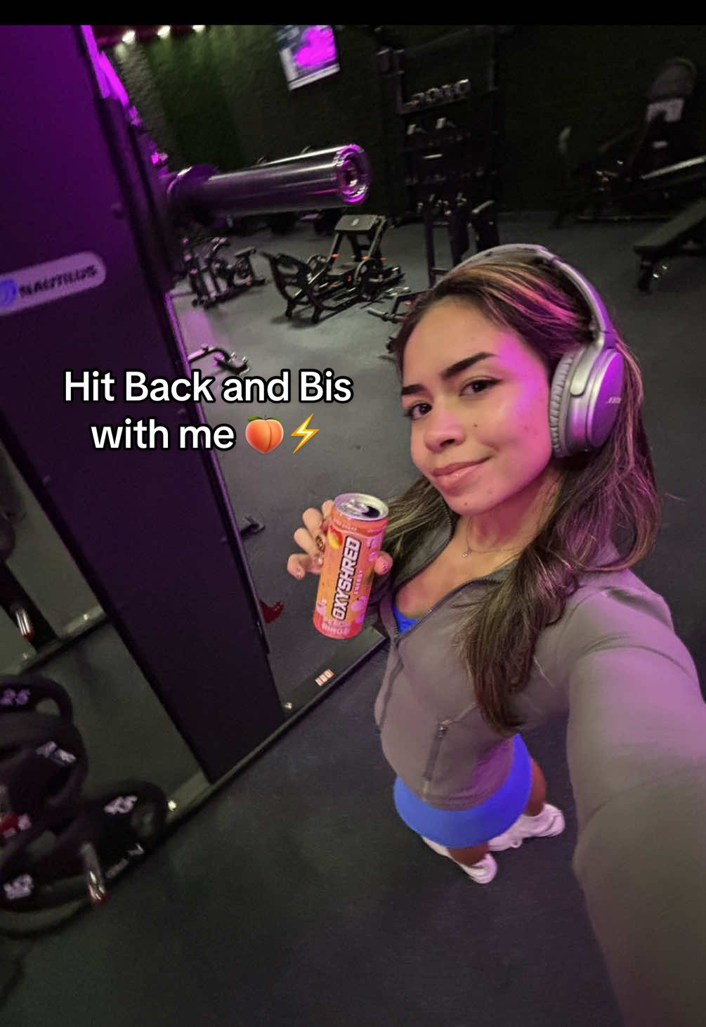 TikTok post by @liftwith.ana for GNC. Caption reads: Hit Back and Bis with me ⚡️Featuring my Peach....