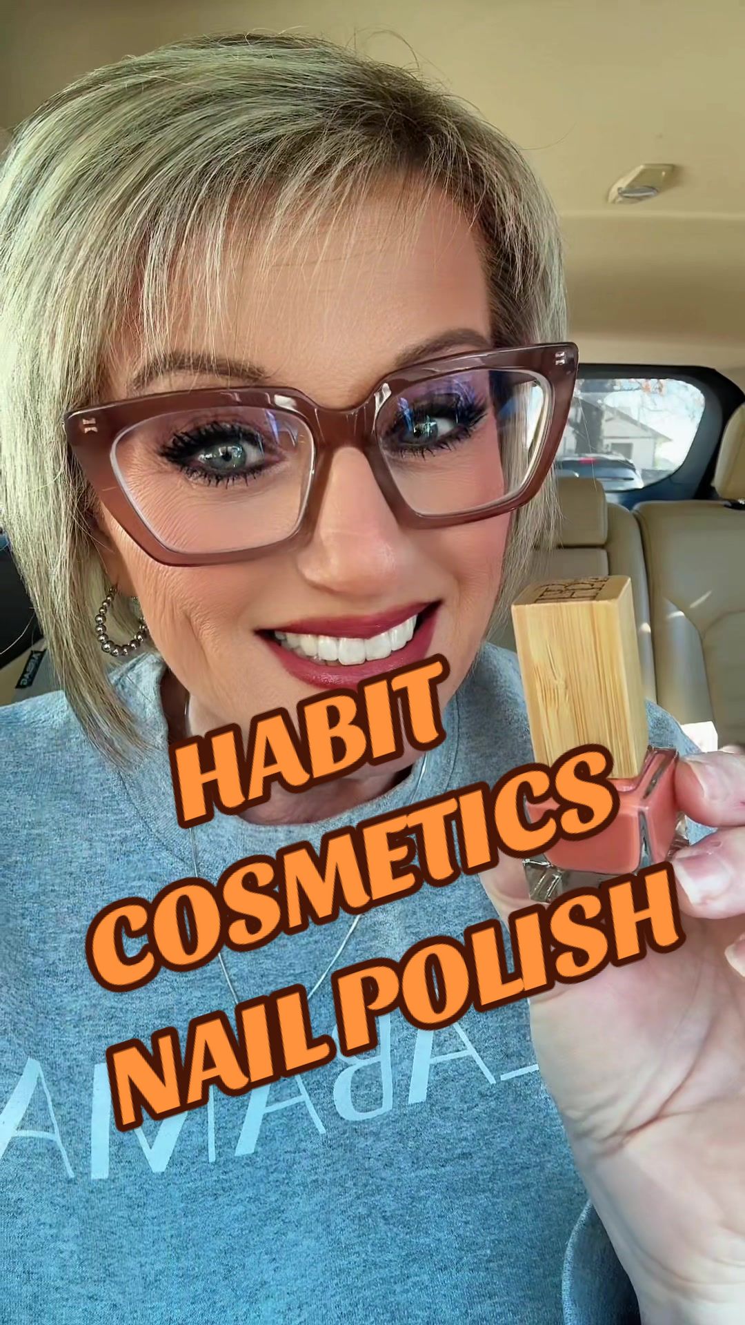 TikTok post by @cawoods70 for Habit Cosmetics. Caption reads: [...] wearing a pretty color polish. @Habit....
