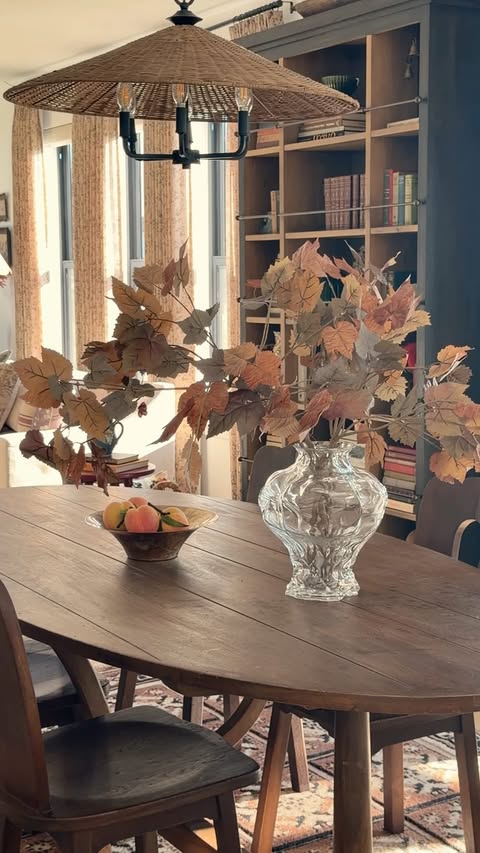 Instagram post by @thegeorgeshome for World Market. Caption reads: [...] stems, pumpkins, and cozy decor from....