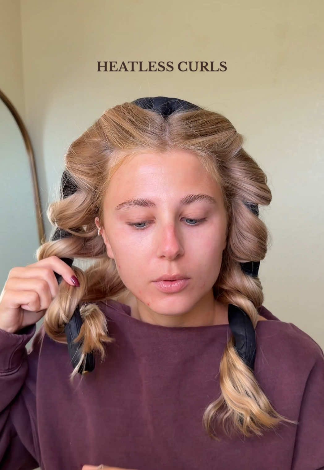 TikTok post by @jennaevelynnn for Moroccanoil. Caption reads: fav party trick is waking up with perf hair....