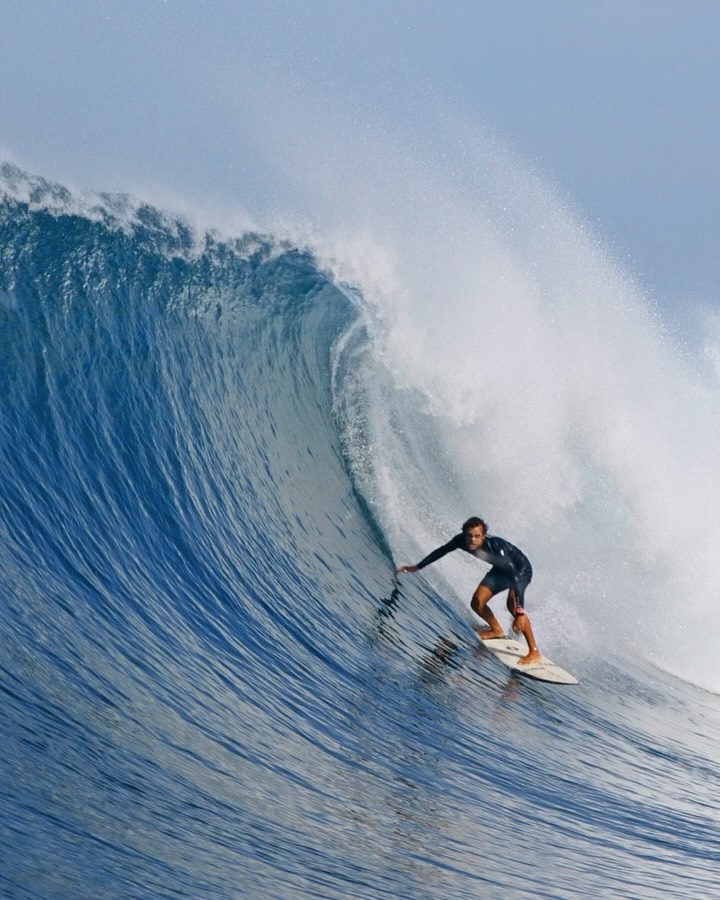Instagram post by @noahbeschen for Swatch. Caption reads: Riding through water with Swatch Proteam athlete....