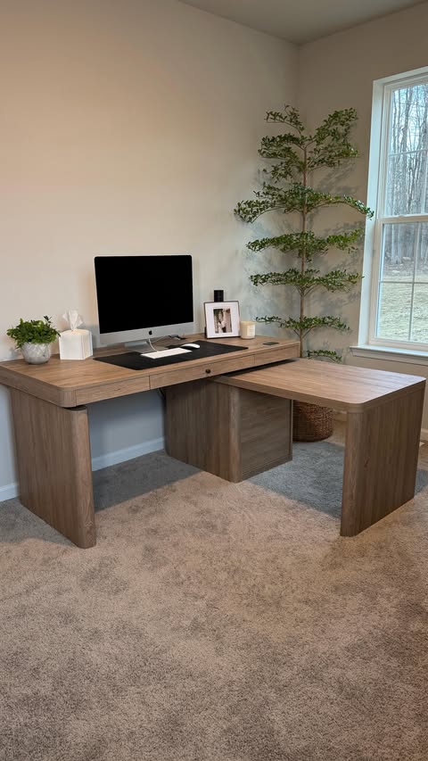 Instagram post by @creatingyourcasa for Hulalahome. Caption reads: 🖥️ Transforming my husband’s workspace with this....