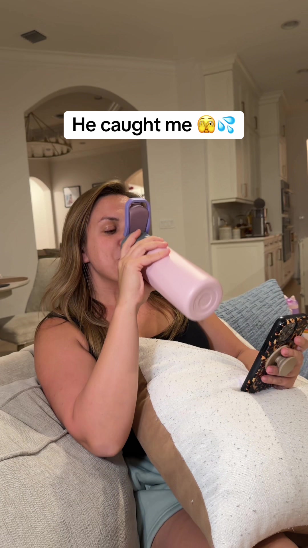TikTok post by @ash.athome for Water H Costa Rica. Caption reads: Staying hydrated with the help of my smart water....