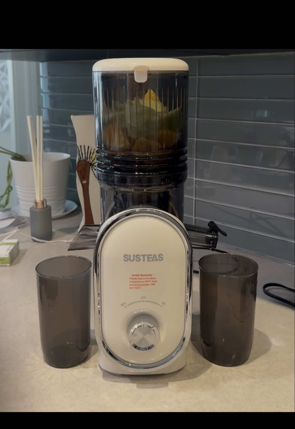 TikTok post by @nafeesat_official for SUSTEAS. Caption reads: Get you a @SUSTEAS US juicer and thank me later 🎉....