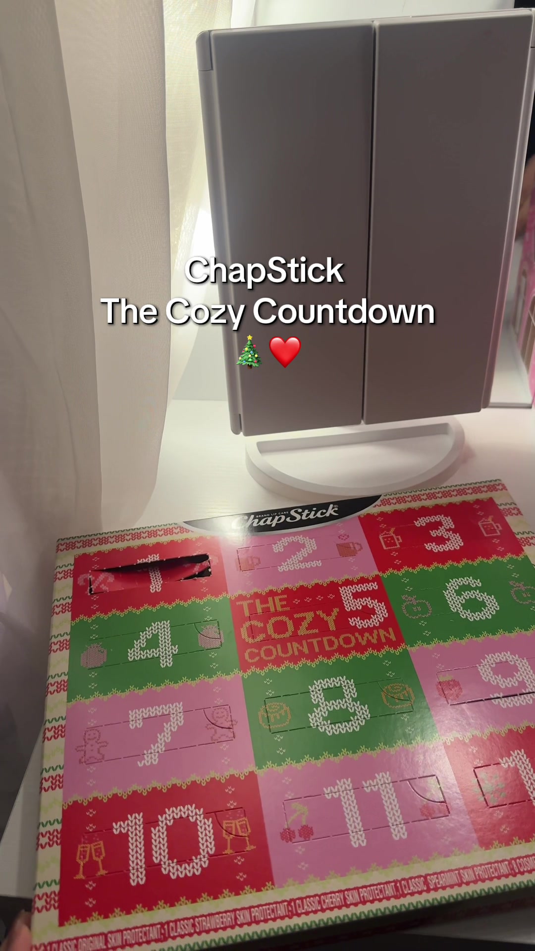 TikTok post by @vivienesilx for ChapStick. Caption reads: The cutest advent calendar!! 🎄❤️ @ChapStick.US....